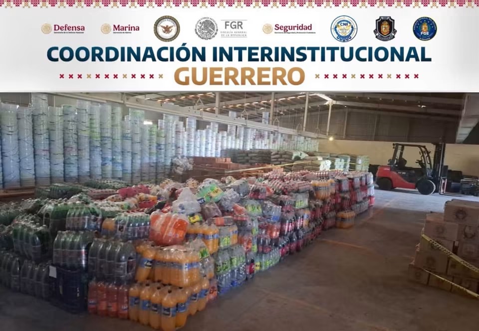 Catean en Taxco presunto centro de almacenamiento ligado a “La Familia Michoacana”; aseguran camiones y mercancía